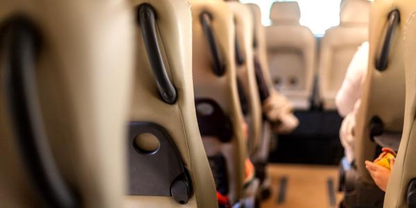 Seats in the interior of a multipassenger van.